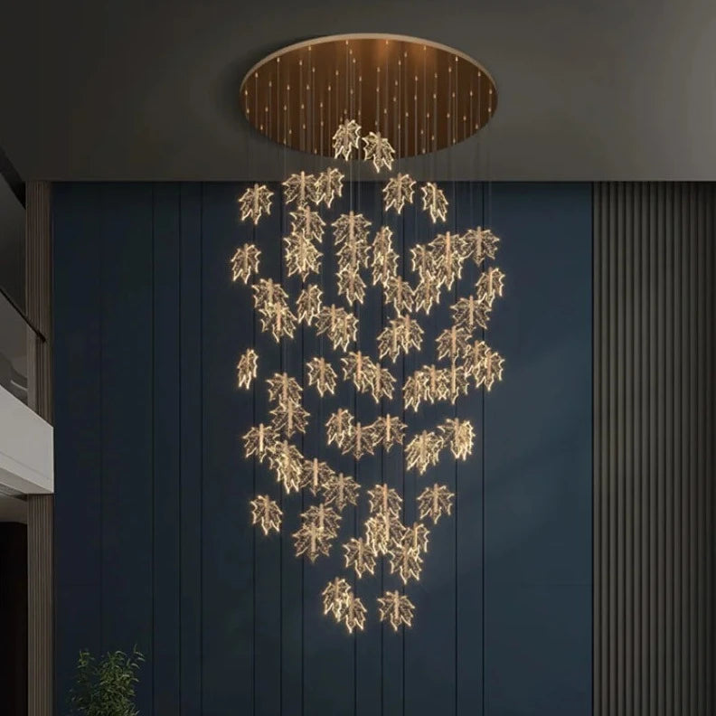 Contemporary Drummondii LED Staircase Chandelier by Lights of Scandinavia, inspired by the elegance of maple leaves, ideal for duplex building halls. Combines Nordic artistry with modern design and advanced LED technology to create an inviting ambiance.