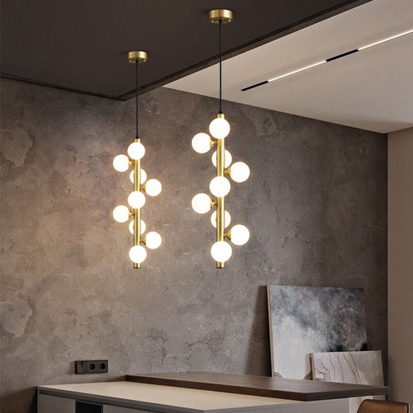 Lights of Scandinavia - Molekyl - Transform your living space into a modern, inviting ambiance with Molekyl's simple LED Chandelier. This sleek, contemporary design is perfect for any interior, from a grand staircase to a cozy bedroom. Its unique polished copper finish will add both style and illumination to any room in your home.