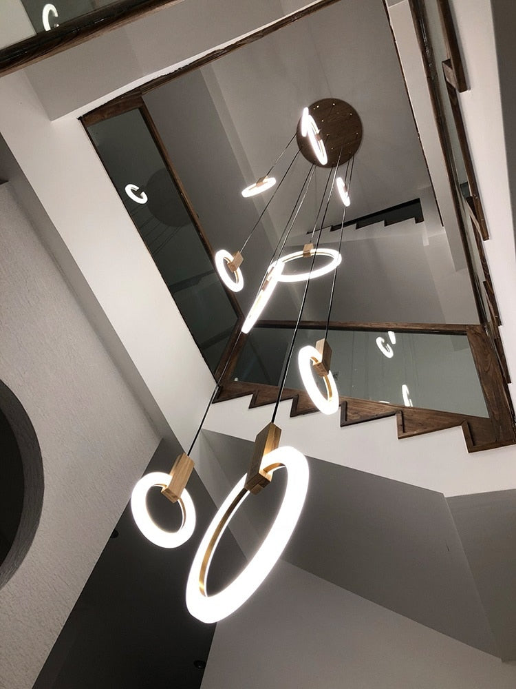 Lights of Scandinavia - Halo - Modern hanging stair LED chandelier. Perfect for creating a mood in any corner or in a stair. Aluminum/acrylic rings. Specifications Light Source LED Bulbs Base Type 2G11 Is Bulbs Included Dimmable Switch Type Power Source AC, 110-240V Lighting Area Coverage Installation Type Semiflush Mount Body Material Acrylic Warranty 2 years Certification CCC, CE, CQC, FCC, GS, LVD, PSE, ROHS, SAA, UL